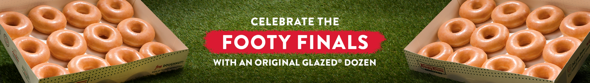 Celebrate Footy Finals with an Original Glazed® Dozen Pack - Original Glazed Dozens with the Krispy Kreme white Dozen box set on a playing field - set up like a showdown poster.