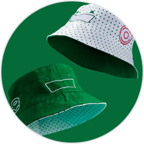 Krispy Kreme Limited Edition Bucket Hat - Green Background with one Green Bucket Hat and one White Bucket Hat which demonstrates the reversible options of the one-size-fits-all single style product