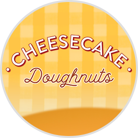 Yellow Tablecloth Pattern background with a promotional logo for Cheesecake Doughnuts