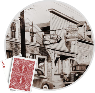 The Start of our Krispy Kreme Story - The Legend. A sepia-toned vintage street scene with an old Krispy Kreme Doughnuts sign, overlaid with a red-backed Ace of Hearts playing card